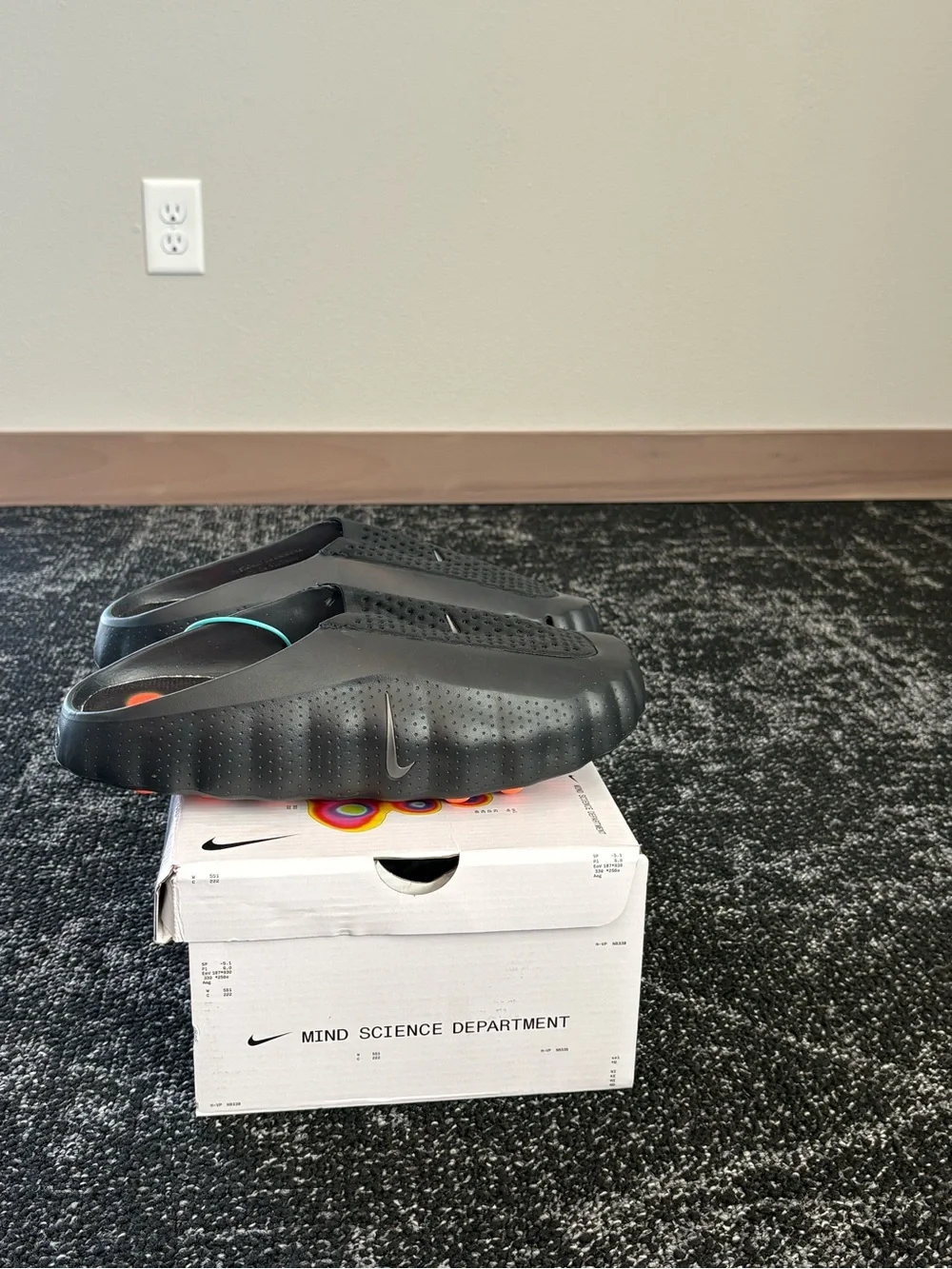 Nike Men’s Black Perforated Slip-On Sandals with Teal Accent
